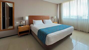 Premium bedding, down comforters, minibar, in-room safe