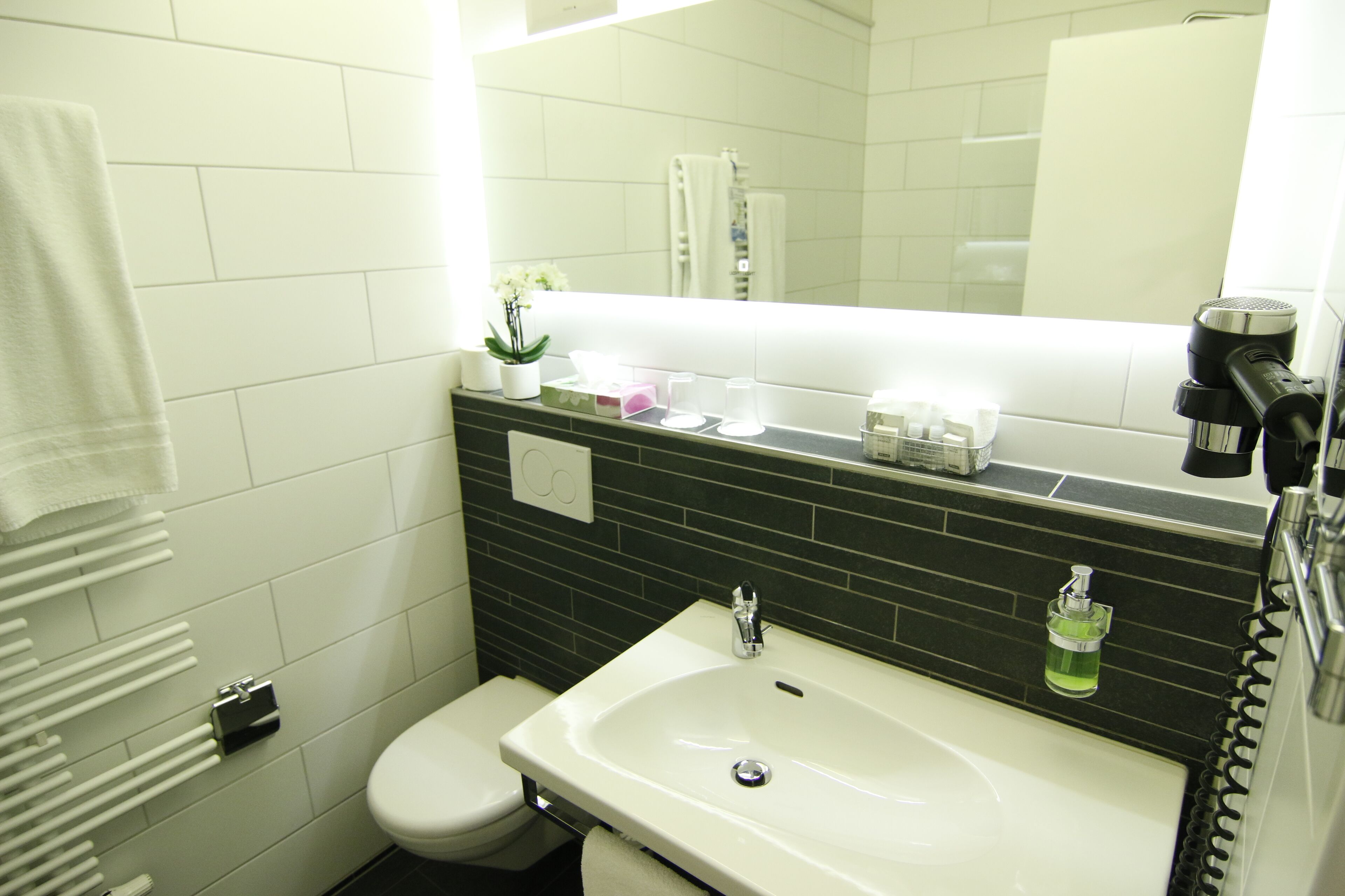 superior double room | bathroom | free toiletries, hair dryer, slippers, towels