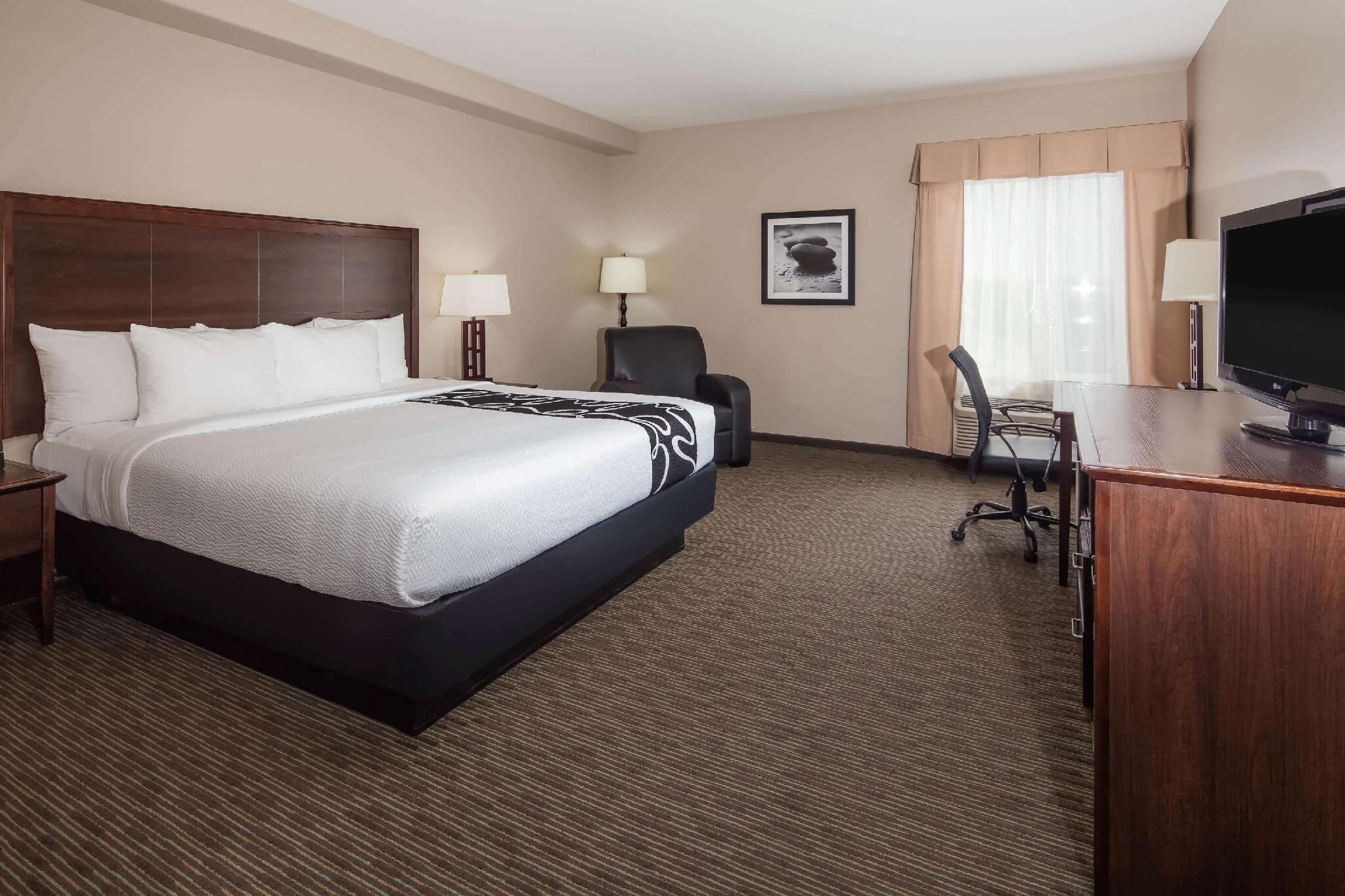Premium bedding, pillowtop beds, desk, laptop workspace