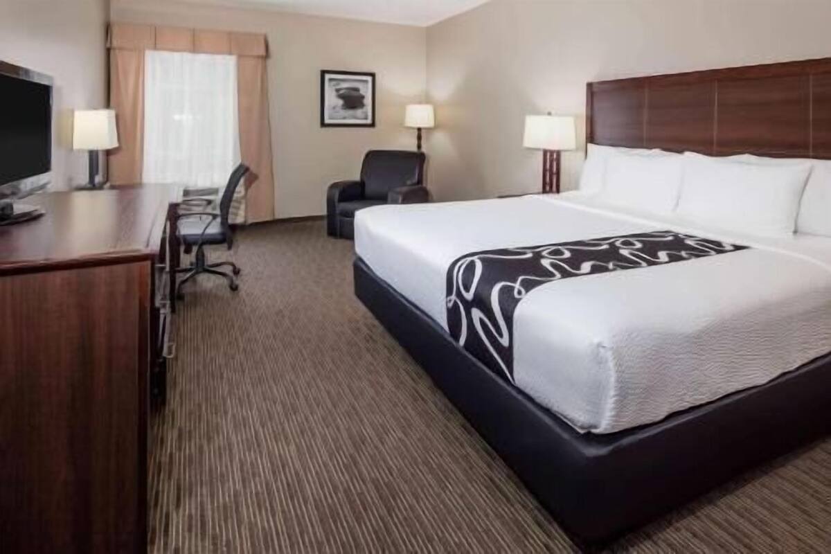 Premium bedding, pillowtop beds, desk, laptop workspace