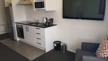Apartment, 3 Bedrooms | Private kitchen | Mini-fridge, microwave, coffee/tea maker, electric kettle