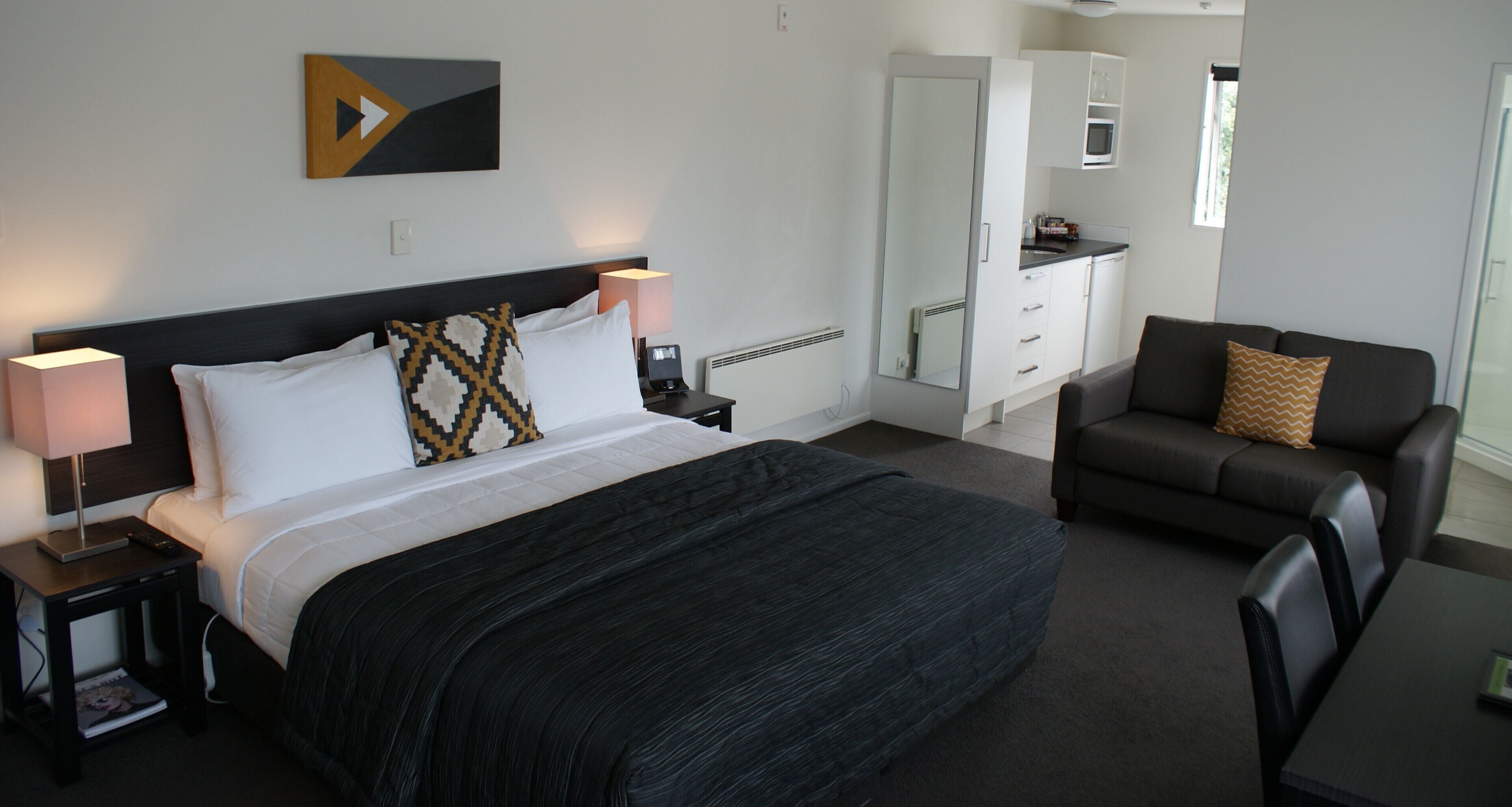 Superior King Studio | Premium bedding, individually decorated, desk, laptop workspace