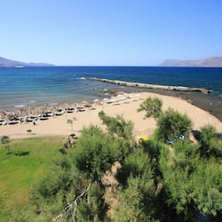 On the beach, sun-loungers, beach umbrellas