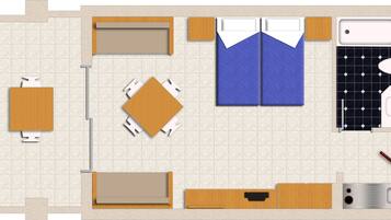 A hotel room layout with a bed, bedside tables, a desk, a chair, a wardrobe, a bathroom with a sink and toilet.