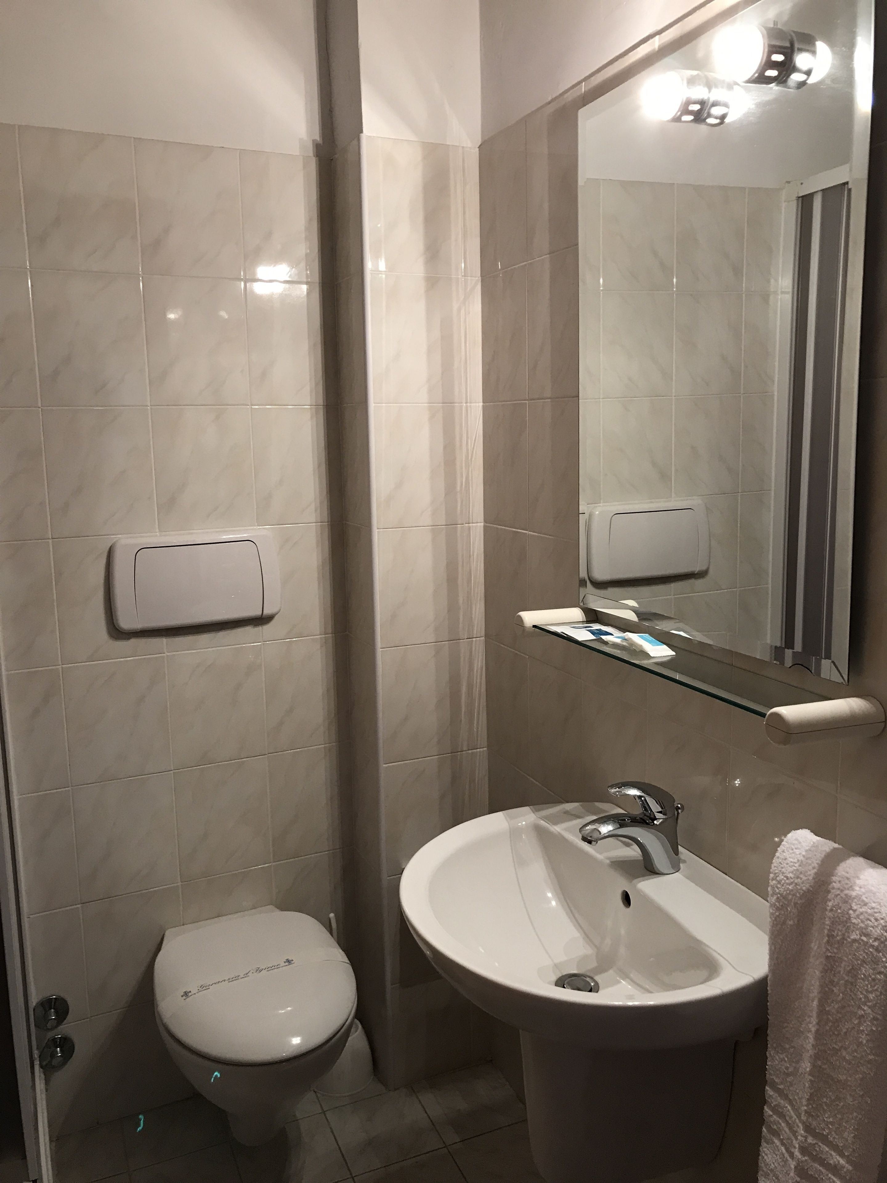 quadruple room | bathroom | shower, free toiletries, hair dryer, bidet