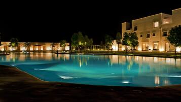 Outdoor pool, pool umbrellas, sun loungers