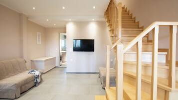 Family Duplex, 2 Bedrooms | Living area | Flat-screen TV