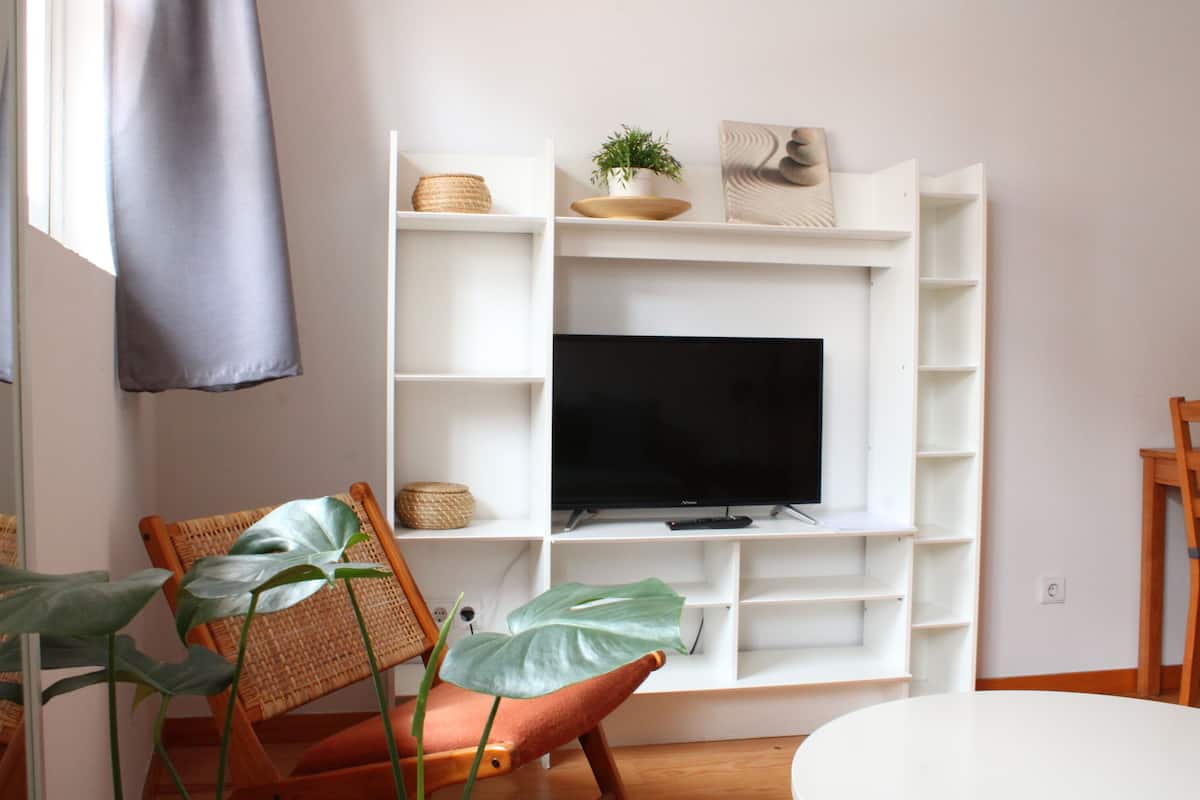 Apartment (4 People) | Living area | 22-inch TV with satellite channels