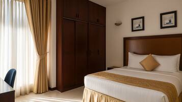 Suite Deluxe | 1 habitación, sábanas de algodón egipcio y ropa de cama de alta calidad