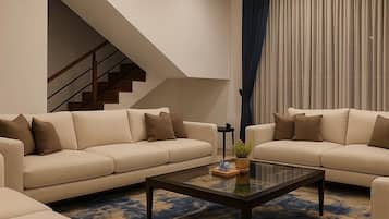 Four Bedroom Penthouse Suite | Living area | Plasma TV, fireplace, DVD player