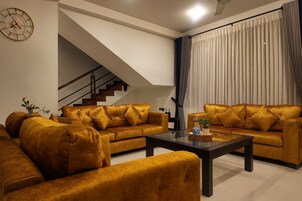 Four Bedroom Penthouse Suite | Living area | Plasma TV, fireplace, DVD player