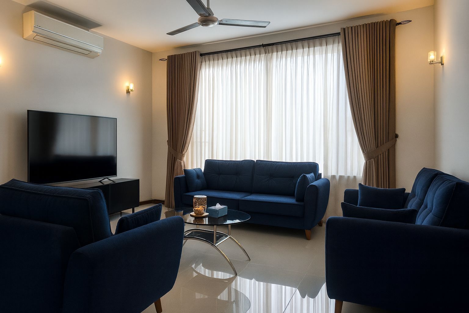 Deluxe-Suite | Wohnbereich | Plasmafernseher, Kamin, DVD-Player