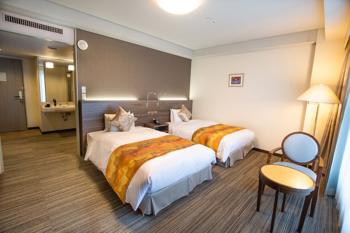 Habitación con 2 camas individuales, accesible para personas con discapacidad | Wifi gratis y ropa de cama