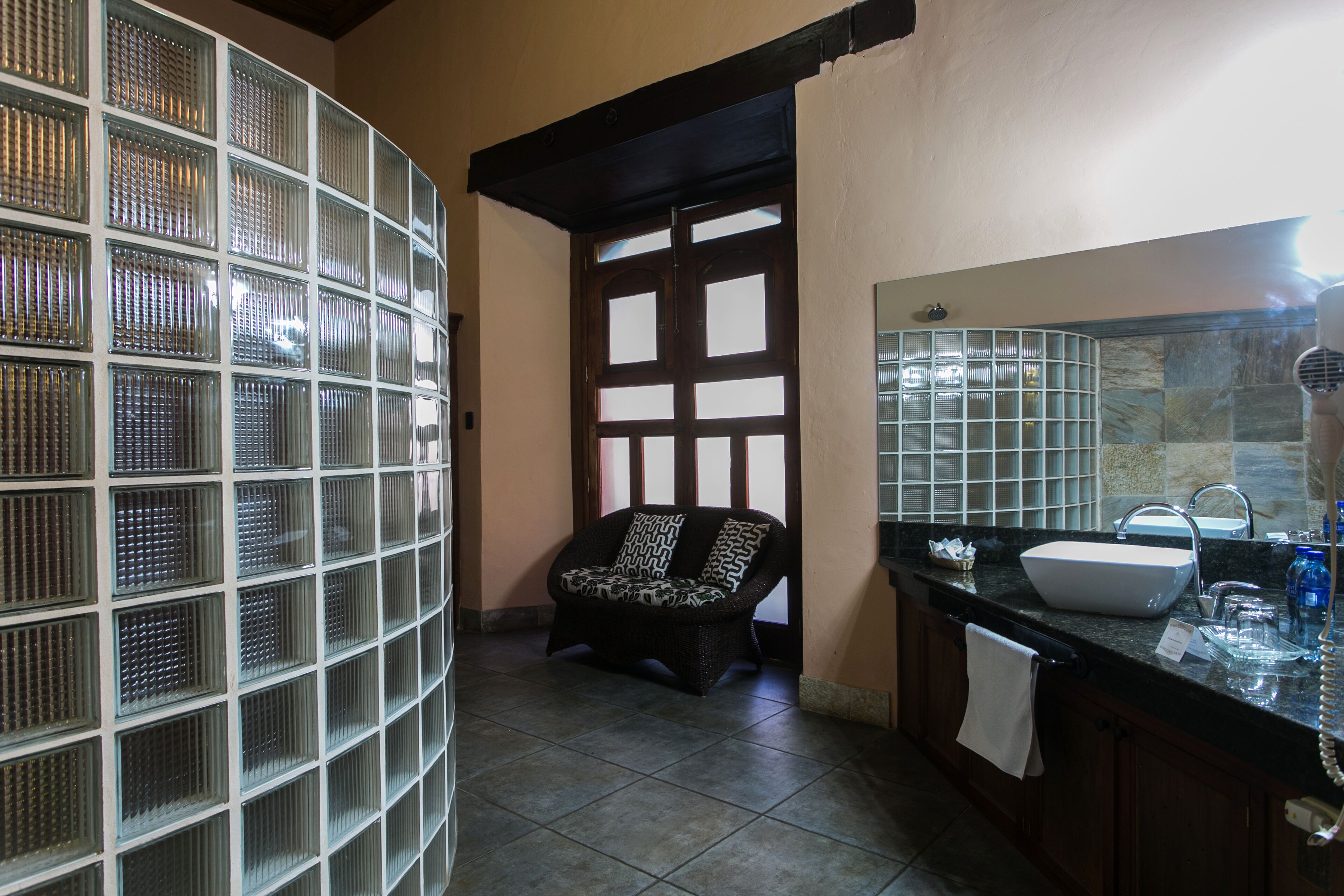 superior suite | bathroom | shower, rainfall showerhead, free toiletries, hair dryer