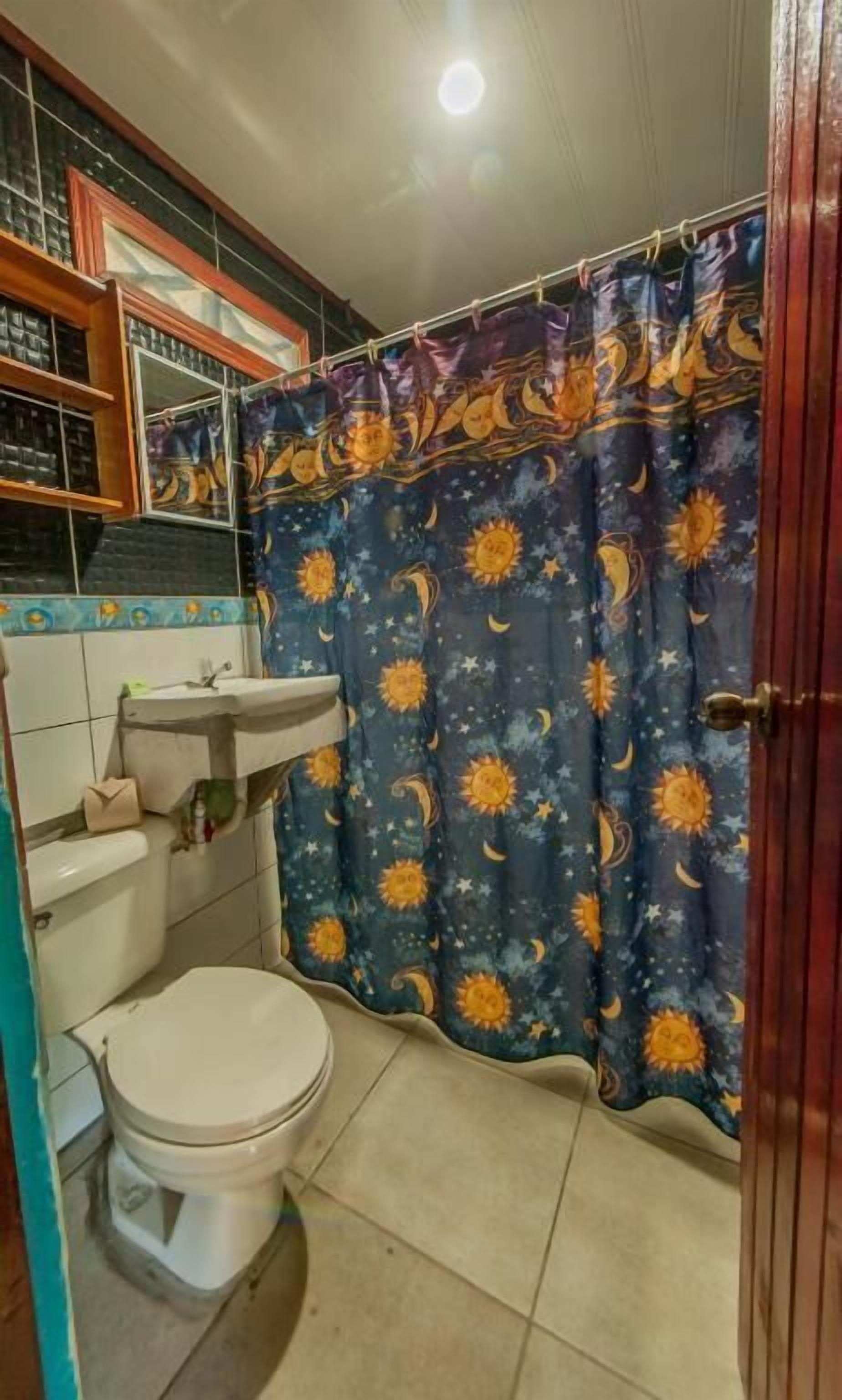 standard double room | bathroom | shower, hair dryer, towels, soap