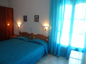 Standardzimmer, 2 Einzelbetten, Bergblick | Pillowtop-Betten, individuell dekoriert, kostenloses WLAN, Bettwäsche