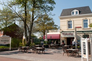 Breakfast, lunch, dinner served; Regional cuisine, garden views 