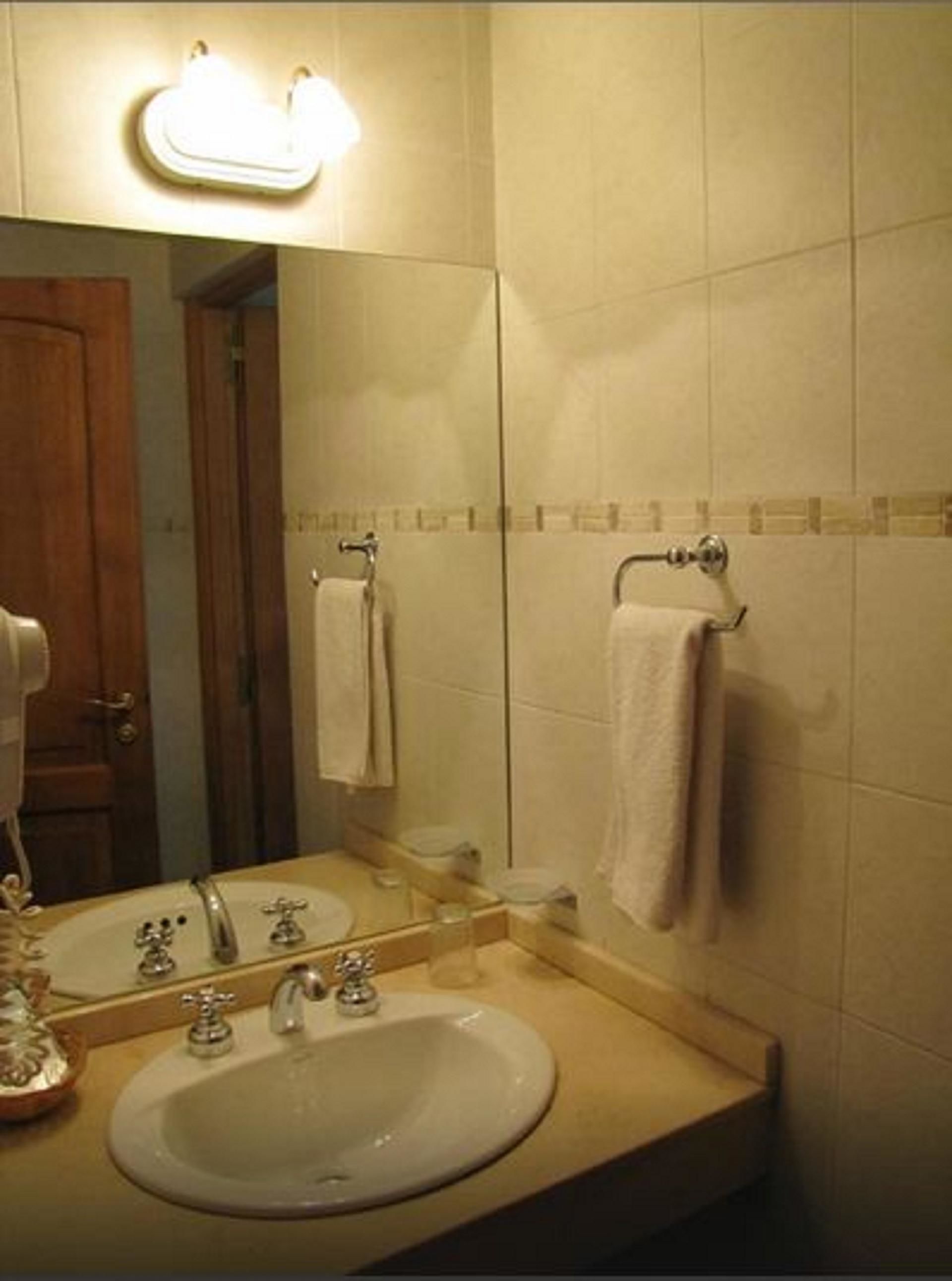 bathroom | combined shower/bathtub, deep-soaking bathtub, rainfall showerhead