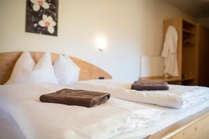 Hypo-allergenic bedding, pillow-top beds, in-room safe, desk