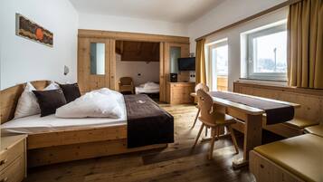 Hypo-allergenic bedding, pillow-top beds, in-room safe, desk