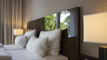 Hypo-allergenic bedding, pillowtop beds, in-room safe