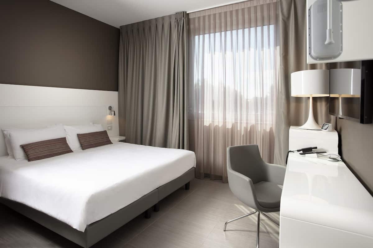 Premium bedding, down comforters, memory foam beds, minibar