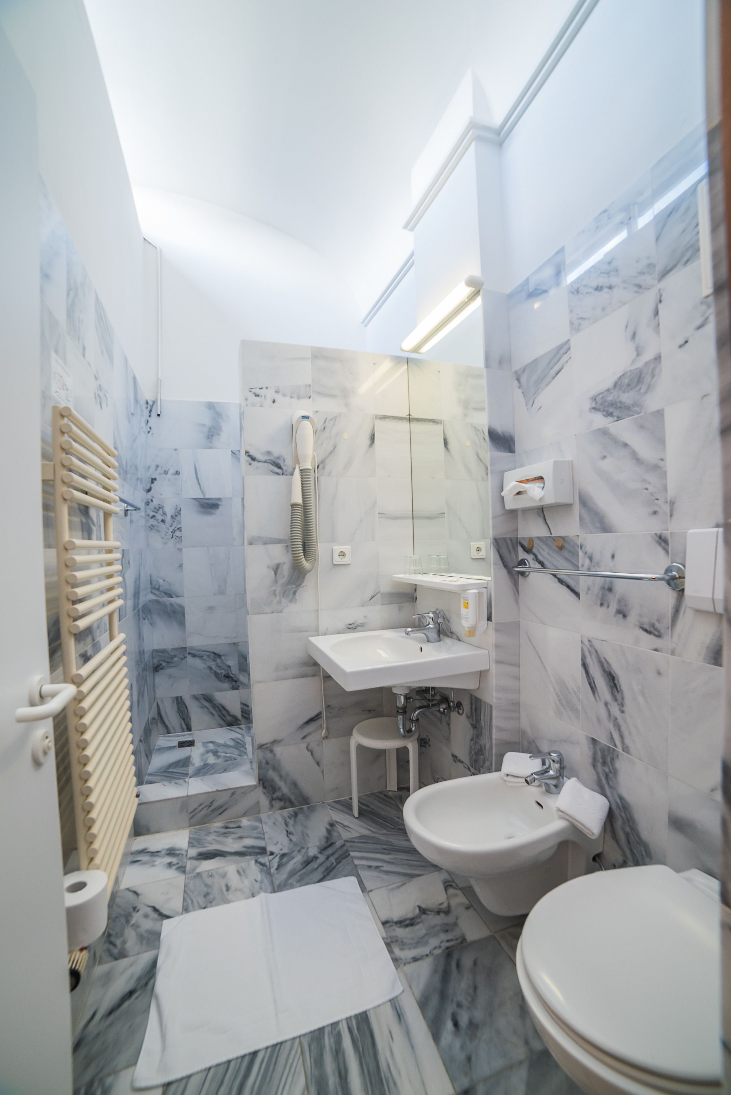 standard double or twin room | bathroom | rainfall showerhead, free toiletries, hair dryer, bidet