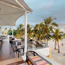 Breakfast, lunch, dinner served; international cuisine, beach views