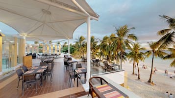Breakfast, lunch, dinner served; international cuisine, beach views
