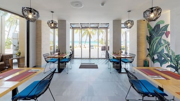 Breakfast, lunch, dinner served; international cuisine, beach views