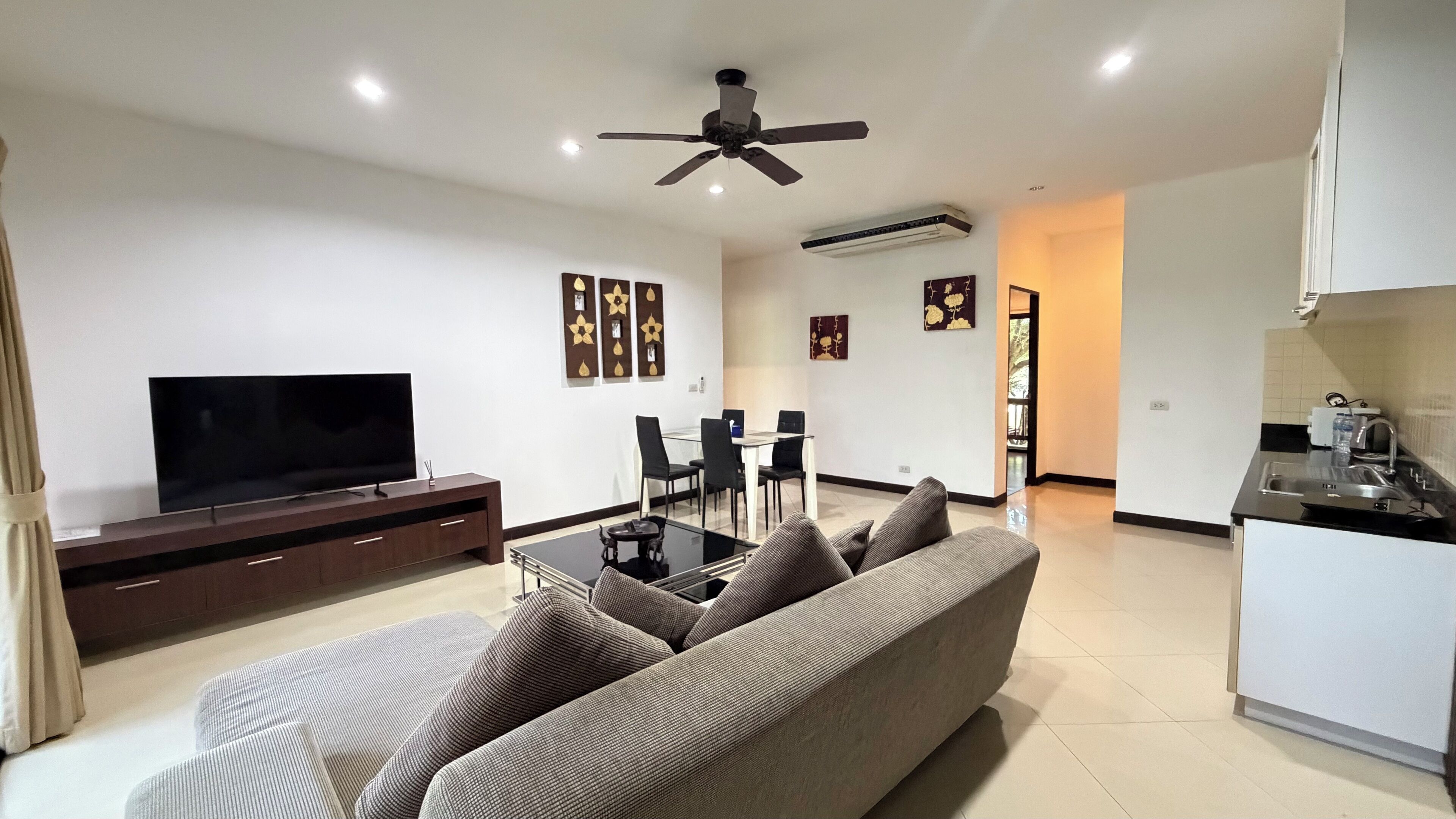 Grand Suite, 3 Bedrooms | Living area | 40-inch LCD TV with digital channels, TV