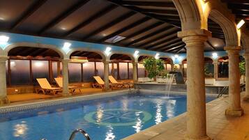 Indoor pool, outdoor pool, pool umbrellas