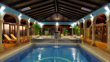 Indoor pool, outdoor pool, pool umbrellas