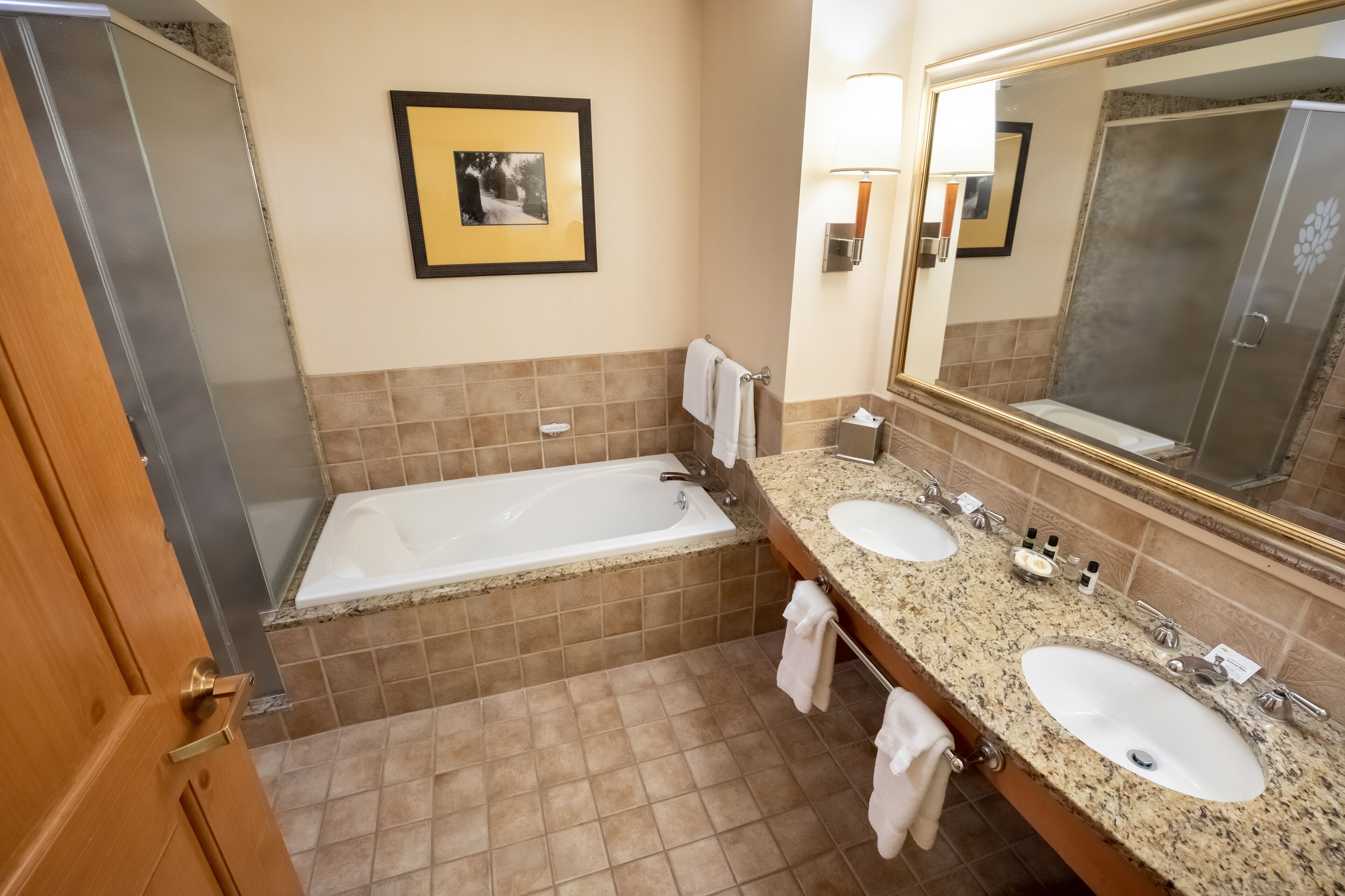 premium double room, 2 queen beds, refrigerator | bathroom | combined shower/bathtub, free toiletries, hair dryer, towels