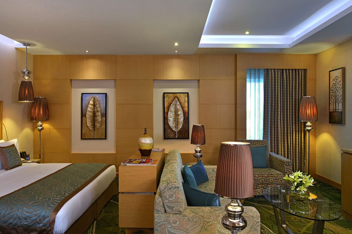 Junior Suite | In-room safe, desk, laptop workspace, iron/ironing board