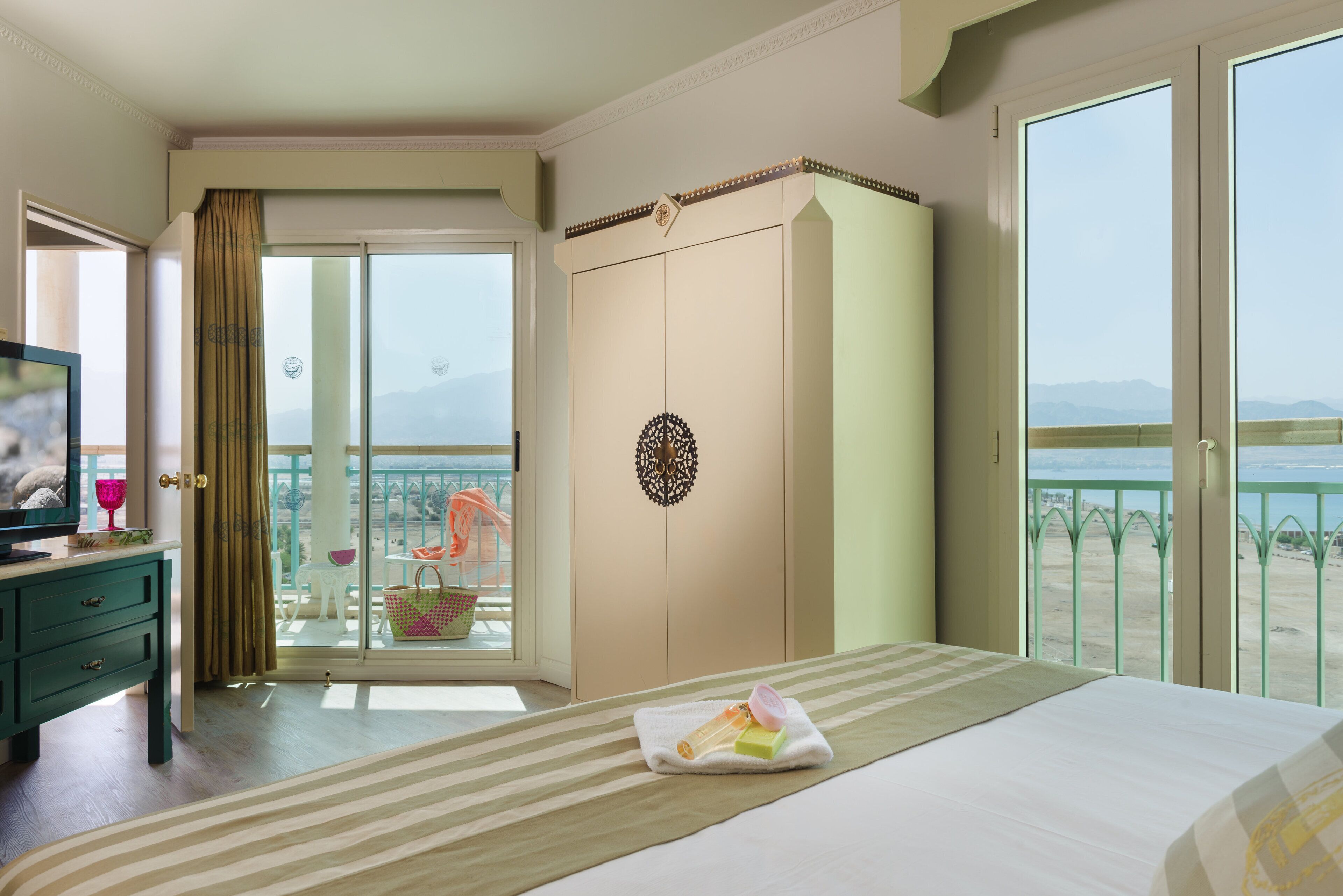 junior suite, balcony, lagoon view | minibar, in-room safe, desk, blackout curtains