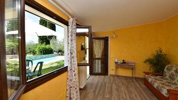 Comfort Triple Room, Poolside (Giglio) | 2 bedrooms, Frette Italian sheets, premium bedding, down comforters