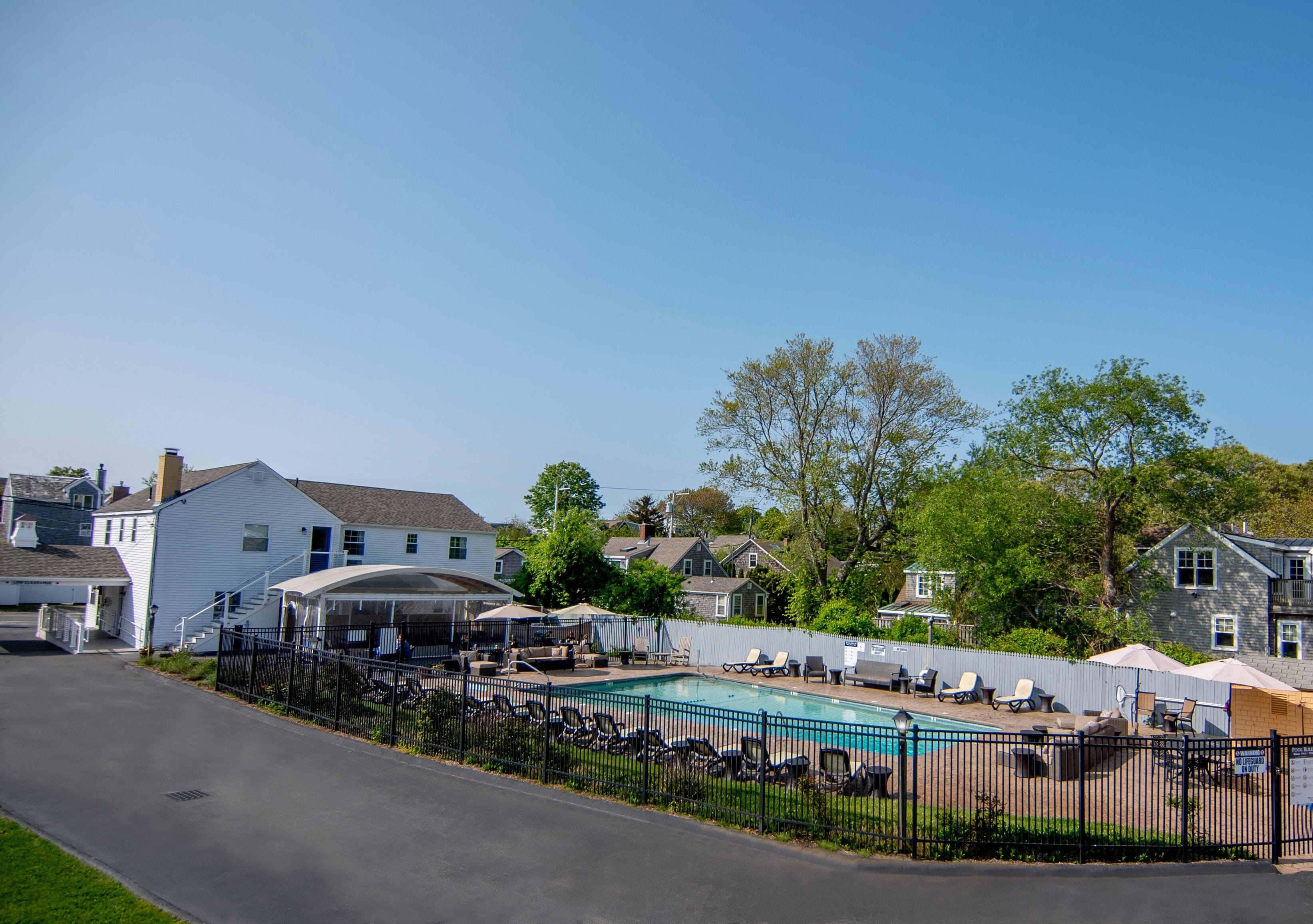 seasonal outdoor pool, open 8:00 am to 9:00 pm, pool umbrellas