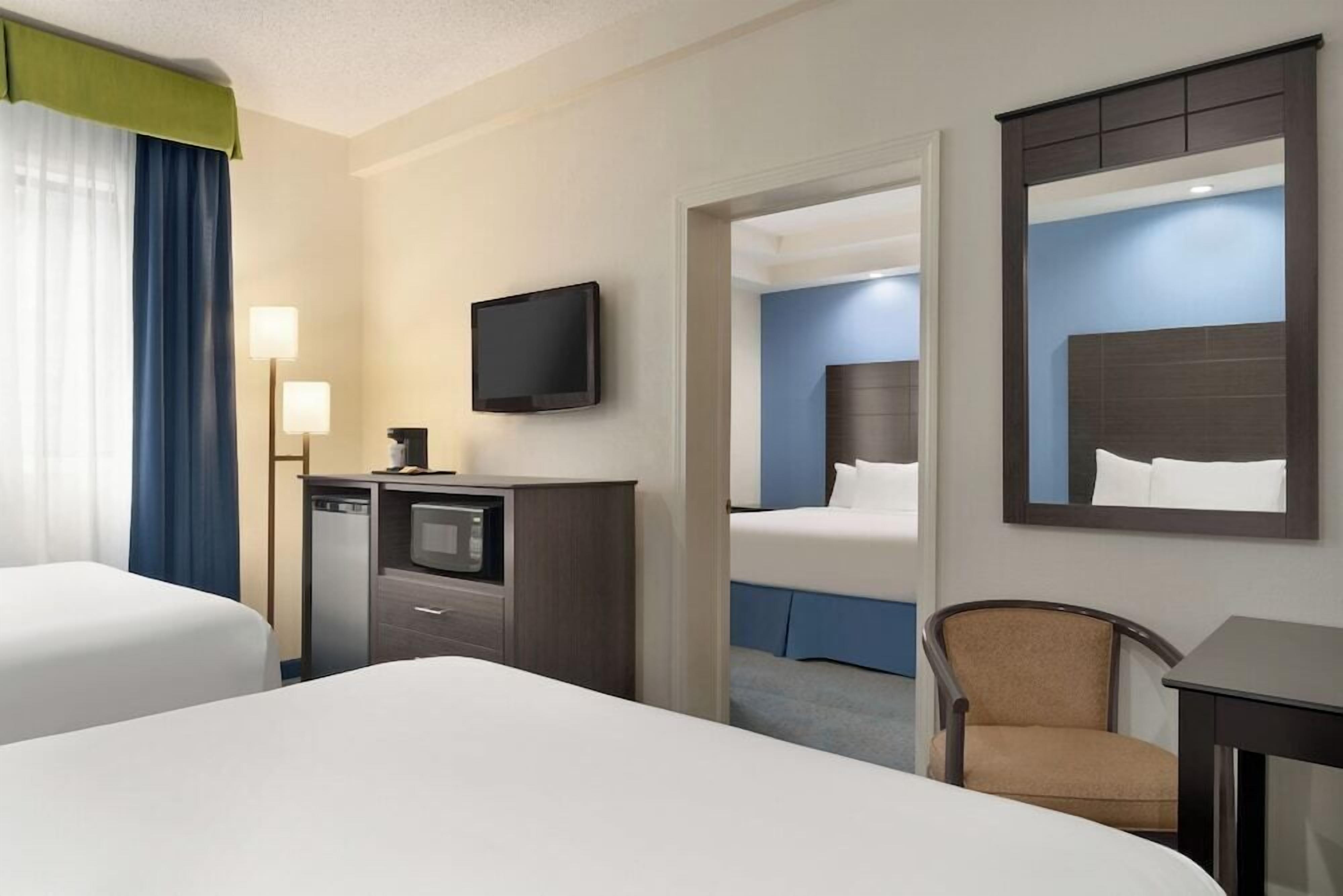 Premium bedding, down duvets, desk, laptop workspace