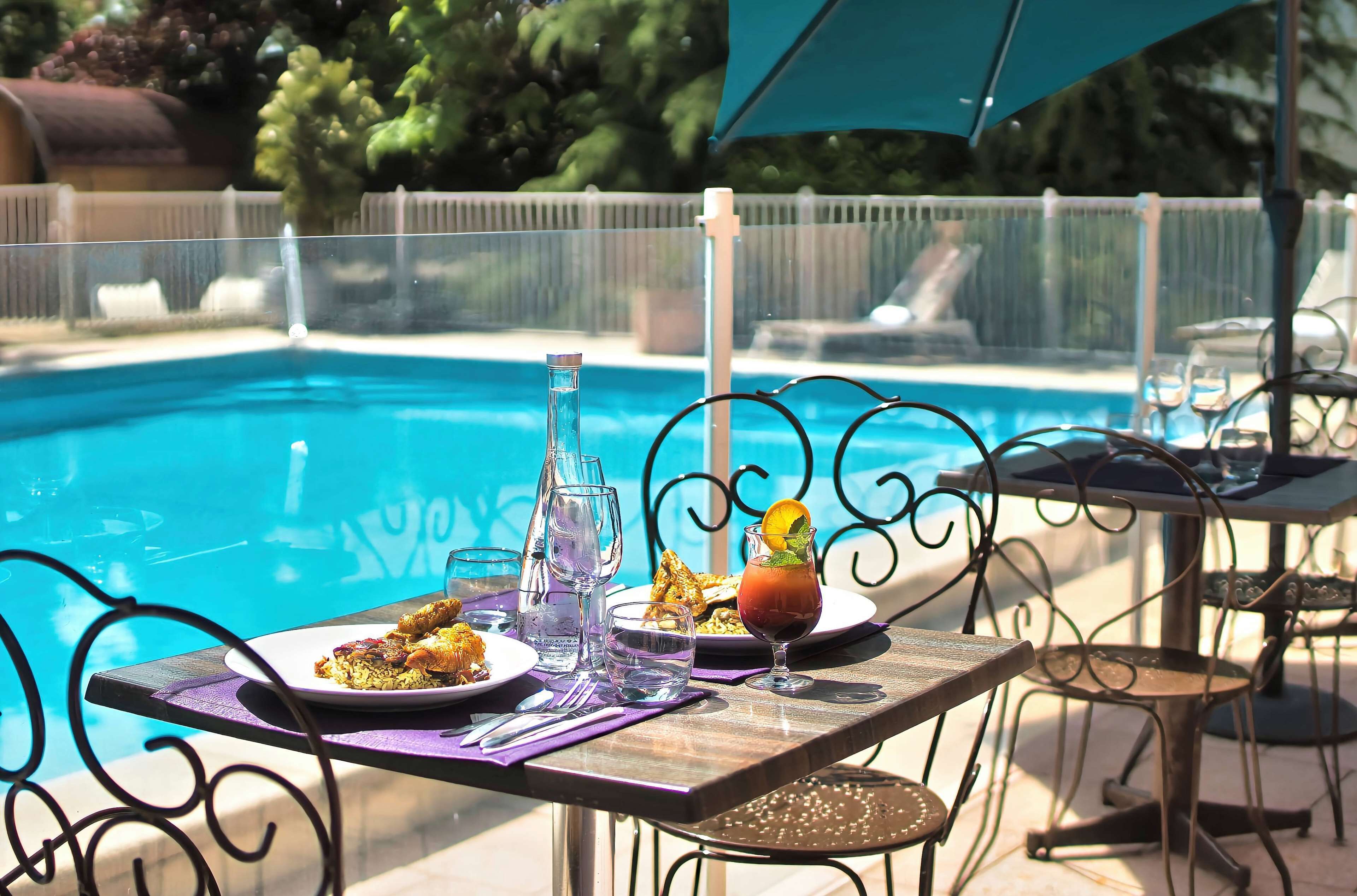 seasonal outdoor pool, pool umbrellas, pool loungers