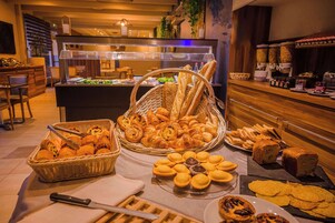 Daily buffet breakfast (EUR 18 per person)