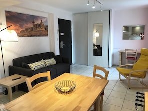 Standard Apartment | Living area | 35-inch LED TV with satellite channels