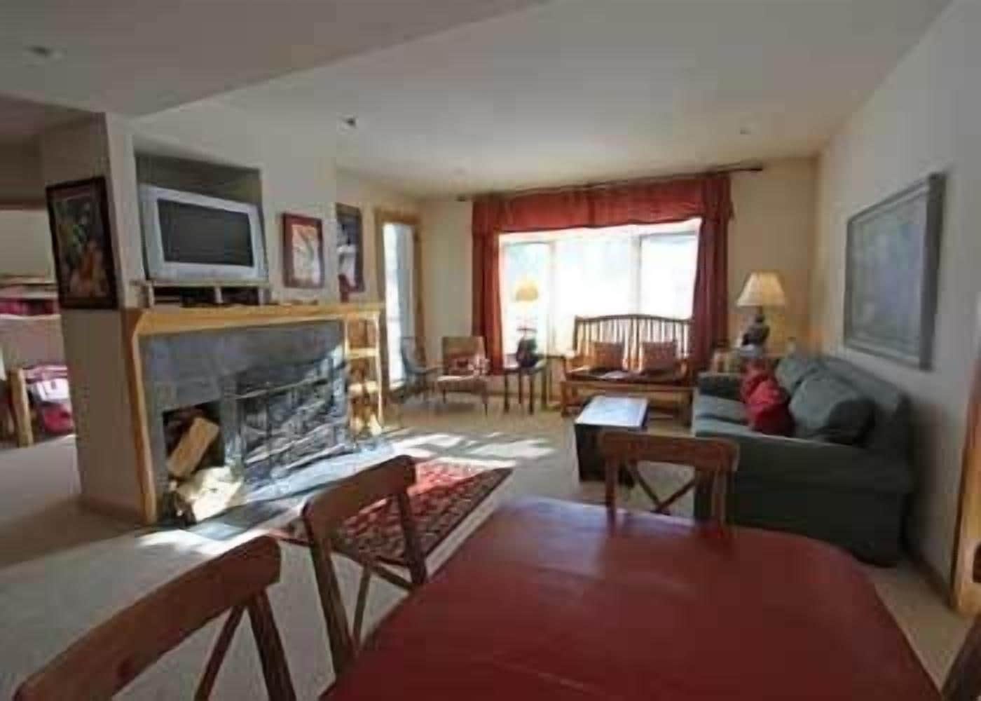 Economy Room, 2 Bedrooms (The Meadows Region) | Living room | 40-inch TV with digital channels, DVD player