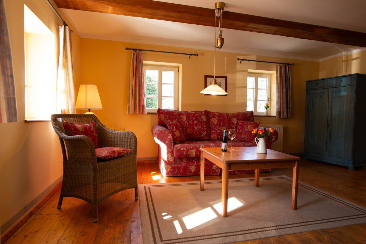 Comfort Duplex, Non Smoking, Corner | Living area | 35-inch flat-screen TV with cable channels