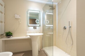 Suite, 1 Bedroom (2 adults) | Bathroom | Shower, rainfall showerhead, free toiletries, hair dryer