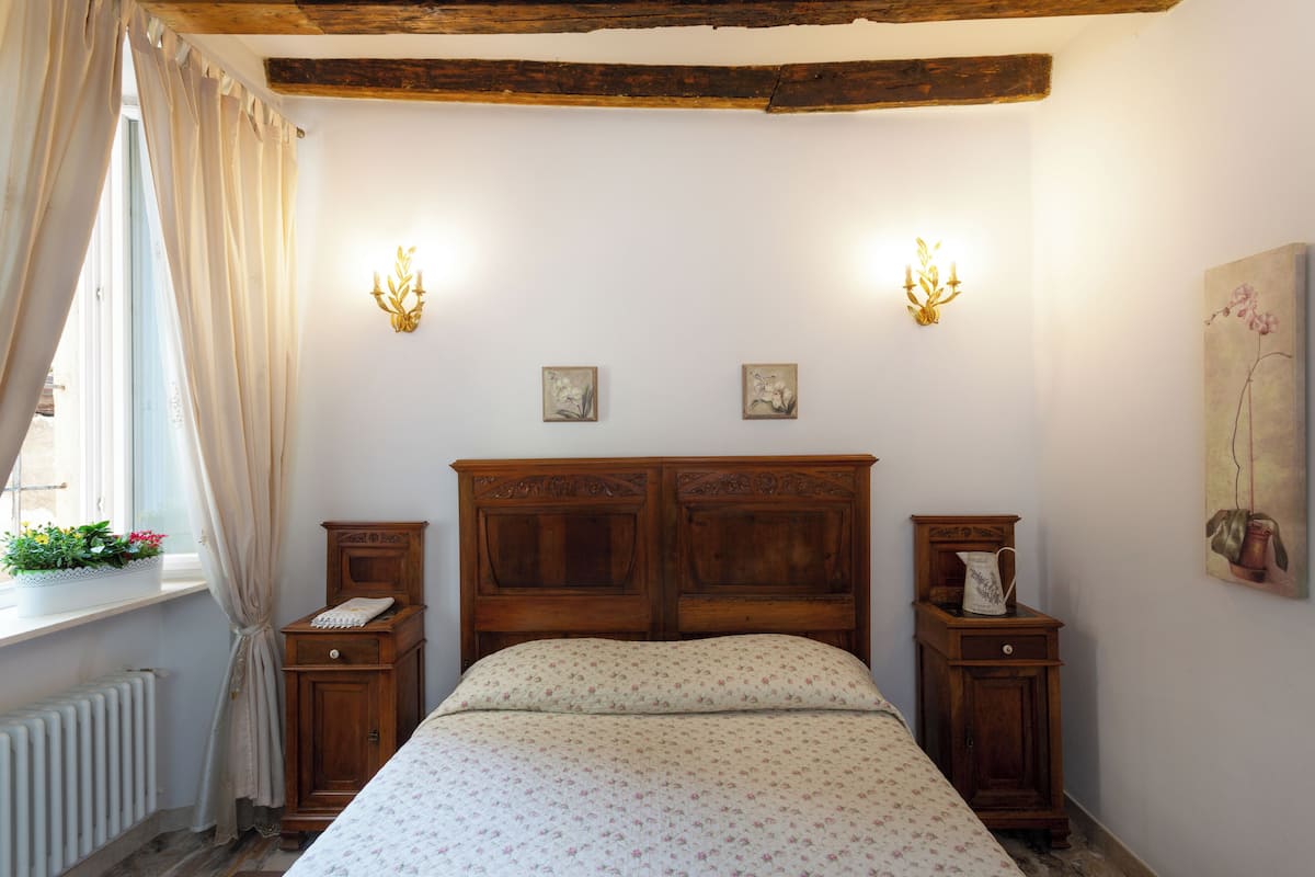 Apartment, 1 Bedroom (PIGNOLETTO Via Pignolo 81) | Premium bedding, down comforters, memory foam beds, minibar