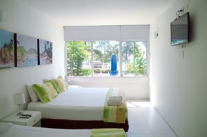 Habitación triple superior | Tabla de planchar con plancha, cunas gratuitas y wifi gratis