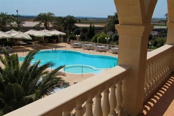 Outdoor pool, pool umbrellas, pool loungers