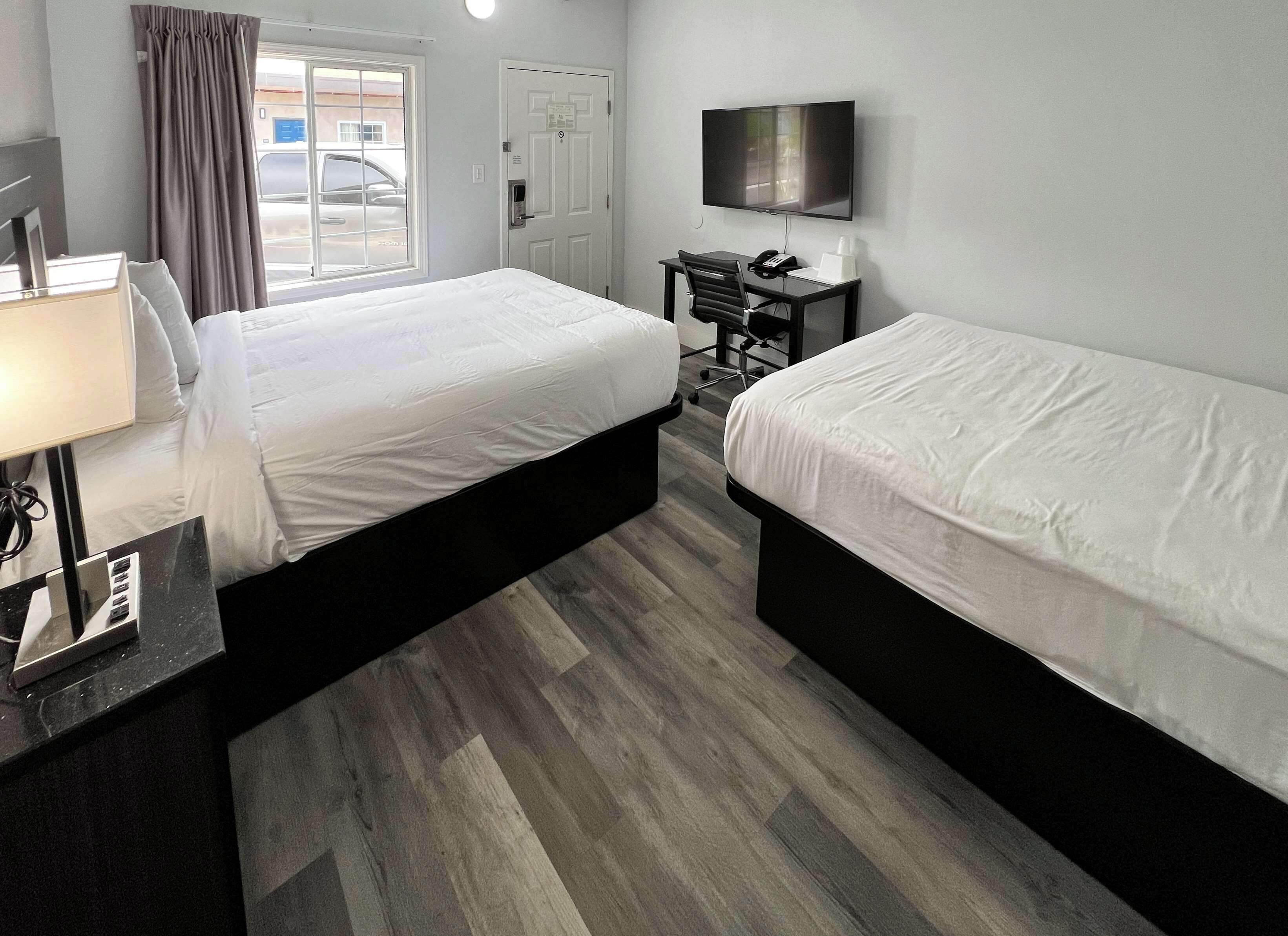 Down comforters, desk, blackout drapes, WiFi (free)