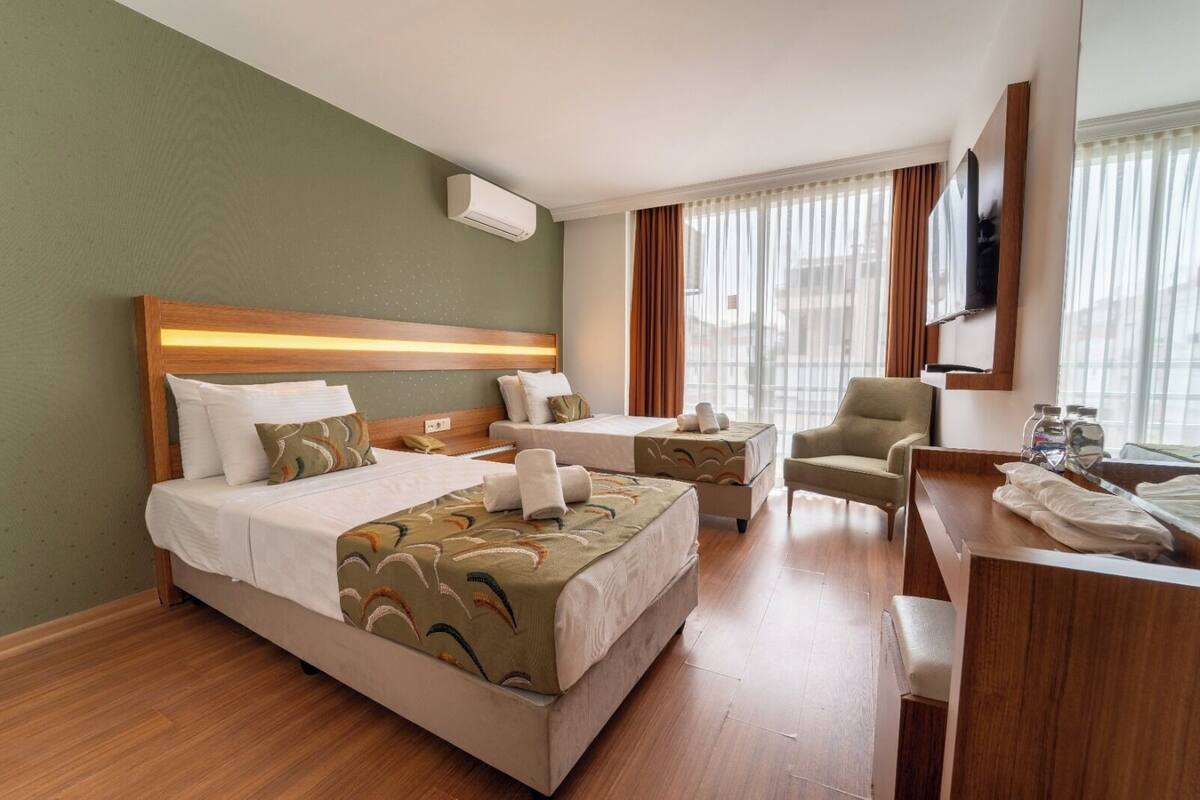 Standaard Twin kamer | Luxe beddengoed, een minibar, een kluis op de kamer